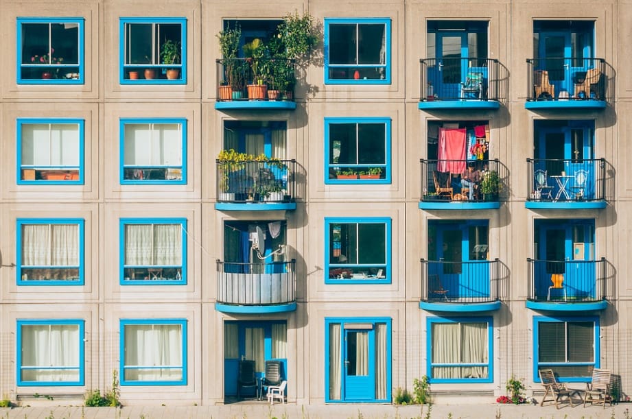 an apartment building with many windows